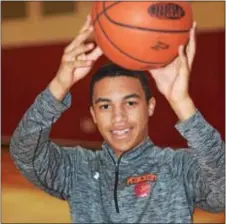  ?? PETE BANNAN — DIGITAL FIRST MEDIA ?? It’s not easy to find Penncrest’s Tyler Norwood without a basketball in his hands. The 2016-17 Boys Basketball Player of the Year follows a grueling shooting routine that enabled him to average 23 points per game and lead the Lions to their first...