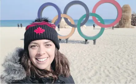  ??  ?? Olympic volunteer Stephanie Cook wears the Maple Leaf at the 2018 Pyeongchan­g Games, her third Olympics experience.