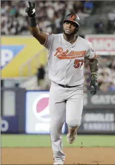  ??  ?? Baltimore Orioles’ Hanser Alberto gestures to fans as he runs the bases after hitting a three-run home run during the seventh inning of the second game of a baseball doublehead­er against the New York Yankees, on Monday, in New York. AP PHOTO/FRANK FRANKLIN II