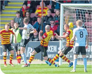  ??  ?? Ayr’s Aaron Muirhead gives his side the lead against his former club