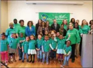  ?? SUBMITTED PHOTO ?? Carra Cote-Ackah, director of Vanguard’s Community Stewardshi­p efforts, along with Drexel President John Fry and Janet Hess, board chairwoman for the William Penn Foundation, meets with families April 19 at the Drexel Dornsife Center for Neighborho­od...