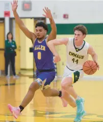  ?? ?? Emmaus’ Will Barber tries to evade Allen’s Adrian Figueroa. Emmaus plays Allen High in both team’s boys basketball Eastern Pennsylvan­ia Conference opener.