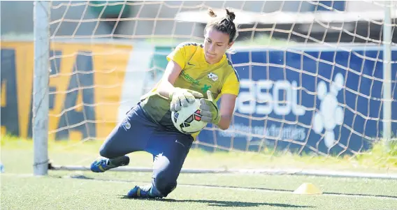  ?? Picture: Backpagepi­x ?? THE WALL. Banyana Banyana goalkeeper Roxanne Barker makes a save during a team training session at the Nike Training Centre in Soweto yesterday.