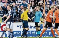  ??  ?? BAIN OF MY EXISTENCE Dens keeper Scott sees red after conceeding penalty in last season’s Dundee derby