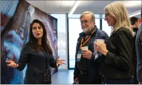 ?? ALAN ARSENAULT — SENTINEL & ENTERPRISE ?? Erica Salazar, magnet systems lead at Commonweal­th Fusion Systems, answers questions from Marty Poutry, center, and Beth Suedmyer, right of the Devens Energy Commission at the ribbon-cutting ceremony on Friday, Feb. 10, 2023.