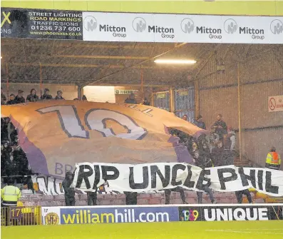  ??  ?? Tribute Motherwell fans display a tribute to Phil O’Donnell