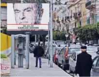  ?? Agence France-presse ?? A portrait of Carlos Ghosn is seen on a publicity billboard at a street in Beirut on Thursday.