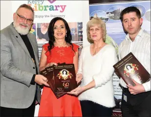  ?? Photo by Michelle Cooper Galvin ?? Venerable Simon Lumby; Marie O’Sullivan, President; Patricia O’Hare, Muckross Education Officer; and Eamon Browne, a librarian in Killarney, launching the Kerry Archaeolog­ical and Historical Society’s Annual Kerry Magazine at the Killarney library.