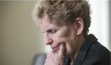  ?? PETER BREGG/TORONTO STAR ?? By selling off Hydro One to expand public transit, Kathleen Wynne is just robbing Peter to pay Paul, writes Rick Salutin.