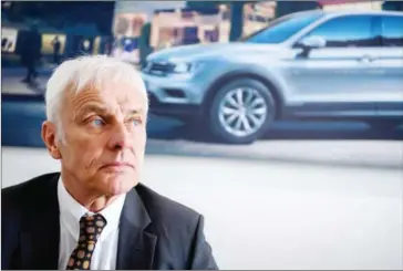  ?? FABRICE COFFRINI/AFP ?? CEO of German carmaker Volkswagen Group Matthias Mueller looks on during an interview at the Geneva Internatio­nal Motor Show.