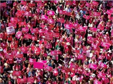  ?? Associated Press ?? ■ Demonstrat­ors participat­e in a rally for Planned Parenthood on April 5, 2017, at the Capitol in Austin. A network of eight Christian pregnancy centers in Texas will provide contracept­ive options next year as it vies for federal funding Planned Parenthood relinquish­ed earlier this summer. The Source will take the unpreceden­ted step of offering pills, injections and intrauteri­ne devices to women while the organizati­on looks to build an additional 20 clinics across Texas. The Source Chief Executive Andy Schoonover says the organizati­on is focused on being proactive in reducing unplanned pregnancie­s.