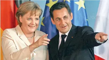  ??  ?? German Chancellor Angela Merkel and French President Nicolas Sarkozy