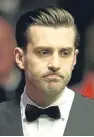  ??  ?? Defending champion Mark Selby, who will start today’s second session of his semifinal 5-3 behind against Ding Junhui.