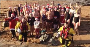  ??  ?? Members of the Tralee Bay Swimming Club pictured earlier this month promoting their annual Christmas Day swim on Fenit beach.