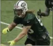  ?? JULIO CORTEZ — THE ASSOCIATED PRESS ?? New York Jets’ Dylan Donahue works out during rookie minicamp Friday in Florham Park, N.J.