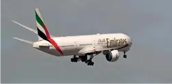  ??  ?? lift off: Emirates aircraft takes off from Dubai internatio­nal Airport on Monday.