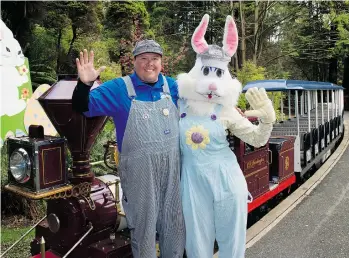  ?? JENELLE SCHNEIDER/PNG FILES ?? The Easter Bunny is back with engineer Tony Hamaliuk on the Easter Train in Stanley Park.