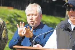  ?? PAMELA WOOD/BALTIMORE SUN ?? Deaf and hard-of-hearing interprete­rs work each of Gov. Hogan’s news conference­s.