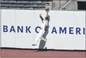  ?? JED JACOBSOHN — THE ASSOCIATED PRESS ?? The Giants’ Wilmer Flores makes a leaping catch at the wall on a ball hit by the Rockies’ Charlie Blackmon during the fifth inning on Thursday in San Francisco.