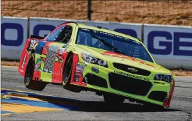  ?? JARED C. TILTON / GETTY IMAGES ?? Dale Earnhardt Jr., driver of the No. 88 Axalta Chevrolet, drives during qualifying for the Monster Energy NASCAR Cup Series Toyota/Save Mart 350.