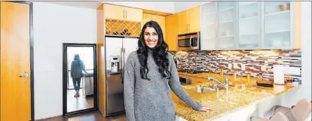  ?? Juhl ?? Nina Parikh is a first-year resident at the University Medical Center and recently purchased her first home at Juhl, a loft-style highrise community in downtown Las Vegas.