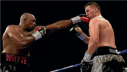  ?? GETTY IMAGES ?? Dillian Whyte, left, beat Kiwi heavyweigh­t Joseph Parker in his latest fight in July.