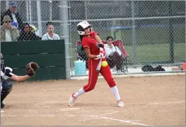  ?? SHAUN HOLKKO — DAILY DEMOCRAT ?? Woodland Christian sophomore left fielder Liliana Trejo swings at a pitch against Rio Americano on Wednesday in Sacramento.