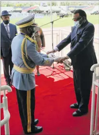  ?? Photo: Presidency ?? Over to you… President Hage Geingob and Air Marshal Martin Pinehas.