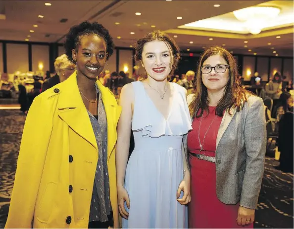  ?? PHOTOS: CODIE McLACHLAN ?? Amelia Hirwa, Viktoria Bradley and Carla Bradley attend the WINGS Luncheon and Fashion Show Sept. 16.