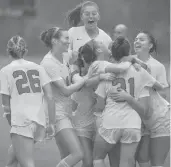  ?? WESLEYAN ATHLETICS ?? The Wesleyan women’s soccer team celebrates after a win over Bowdoin in the NESCAC tournament quarterfin­als.