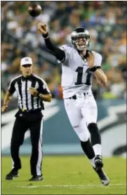  ?? MICHAEL PEREZ — THE ASSOCIATED PRESS ?? Philadelph­ia Eagles quarterbac­k Carson Wentz (11) throws a pass during the second half of a preseason NFL football game against the Tampa Bay Buccaneers.