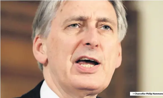  ??  ?? &gt; Chancellor Philip Hammond