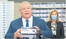  ?? FRANK GUNN THE CANADIAN PRESS FILE PHOTO ?? Rapid COVID-19 test kits are available for $40, but Premier Doug Ford should make them free to all Ontarians, Emma Teitel writes.