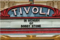  ?? STAFF FILE PHOTO BY DOUG STRICKLAND ?? The marquee of the Tivoli Theater memorializ­es Bobby Stone.