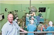  ?? /Richard Holmes ?? Medical heritage: Hennie Joubert, founder of the Heart of Cape Town Museum in operating theatre 2A, with its clock frozen forever at 5.58am.