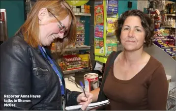  ??  ?? Reporter Anna Hayes talks to Sharon McGee.