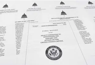  ?? AP/JON ELSWICK ?? PAGES from the final report released by the House select committee investigat­ing the January 6 attack on the US Capitol is photograph­ed on Thursday, December 22, 2022.