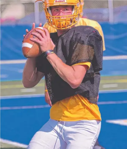  ?? | WORSOM ROBINSON/ FOR THE SUN- TIMES ?? Senior quarterbac­k Ben Bryant gives Lyons a legitimate shot at winning the Class 8A state title.