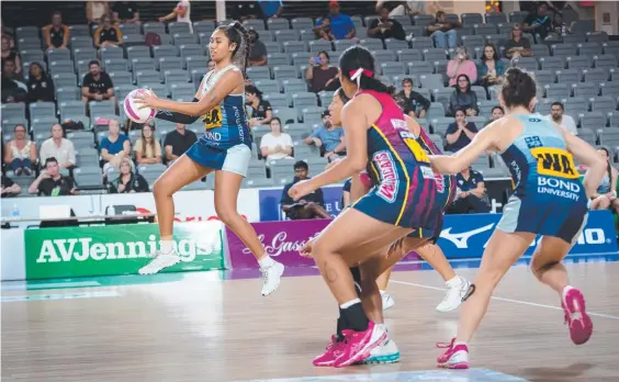  ??  ?? Bond University’s Talita Faifai in full flight during her sharp-shooting performanc­e at the state titles. Picture: Netball Queensland