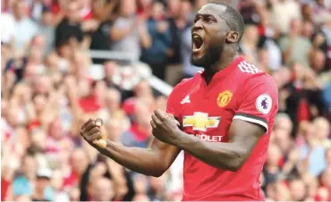  ??  ?? Romelu Lukaku celebrates after scoring for Manchester United. He joined United from Everton for a whopping $75m.