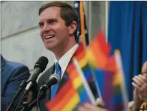  ?? BRYAN WOOLSTON — THE ASSOCIATED PRESS ?? Kentucky’s Democratic Gov. Andy Beshear speaks a rally held by the Fairness Campaign to advance LGBTQ rights on Wednesday in the Capitol Rotunda in Frankfort, Ky.