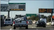  ?? KARL MONDON - STAFF PHOTOGRAPH­ER ?? Signs seen Feb. 8 on Highway 101 in Palo Alto tell of charges beginning Feb. 11 for toll lane travel from Whipple Avenue to the San Mateo-santa Clara County line.