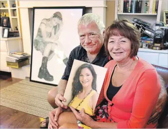  ?? BOB TYMCZYSZYN THE ST. CATHARINES STANDARD ?? Wayne and Helga Campbell, in a file photo with a picture of their daughter Katey, who died by suicide five years ago.