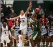  ?? RANDY MEYERS — FOR THE MORNING JOURNAL ?? Lorain’s Aidan Brown contests the shot by Seth Wilson of Akron SVSM during the second quarter of the Play by Play Classic on Jan. 6.