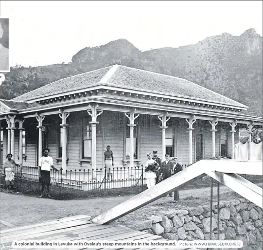  ?? Picture: WWW.FIJIMUSEUM.ORG.FJ ?? A colonial building in Levuka with Ovalau’s steep mountains in the background.