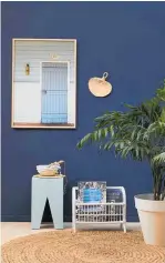  ?? Photo / Bryce Carleton ?? Bring coastal indoors with all the colours of the beach, like this room with walls in Resene Indian Ink and floor in R. Colorwood Whitewash. Project by Kate Alexander.