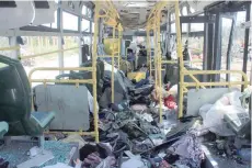  ?? — AFP ?? A picture shows the damage inside a bus a day after a car bombing attack in Rashidin, west of Aleppo.