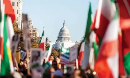  ?? Photograph: Allison Bailey/NurPhoto/ REX/Shuttersto­ck ?? Iranians march in front of the Capitol building in Washington last month in support of the protests.