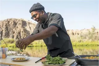  ??  ?? Rashad Frazier boosting morale
with delicious dishes and a smile
on his face.