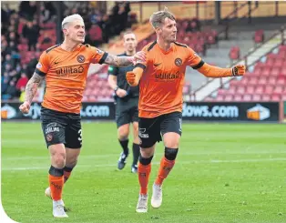  ??  ?? Dundee United’s Billy King turns to the fans after making it 2-0